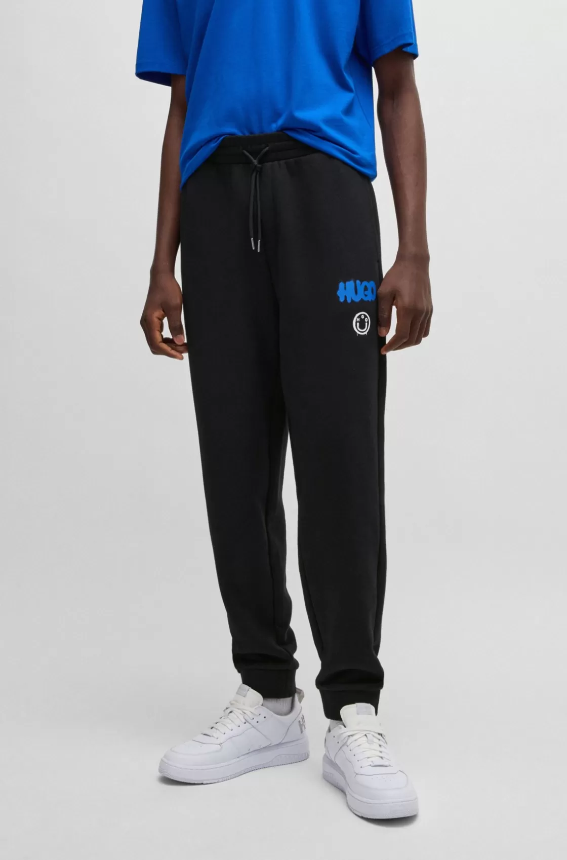 HUGO BOSS Cotton-terry Tracksuit Bottoms With Happy HUGO Logo Black Flash Sale