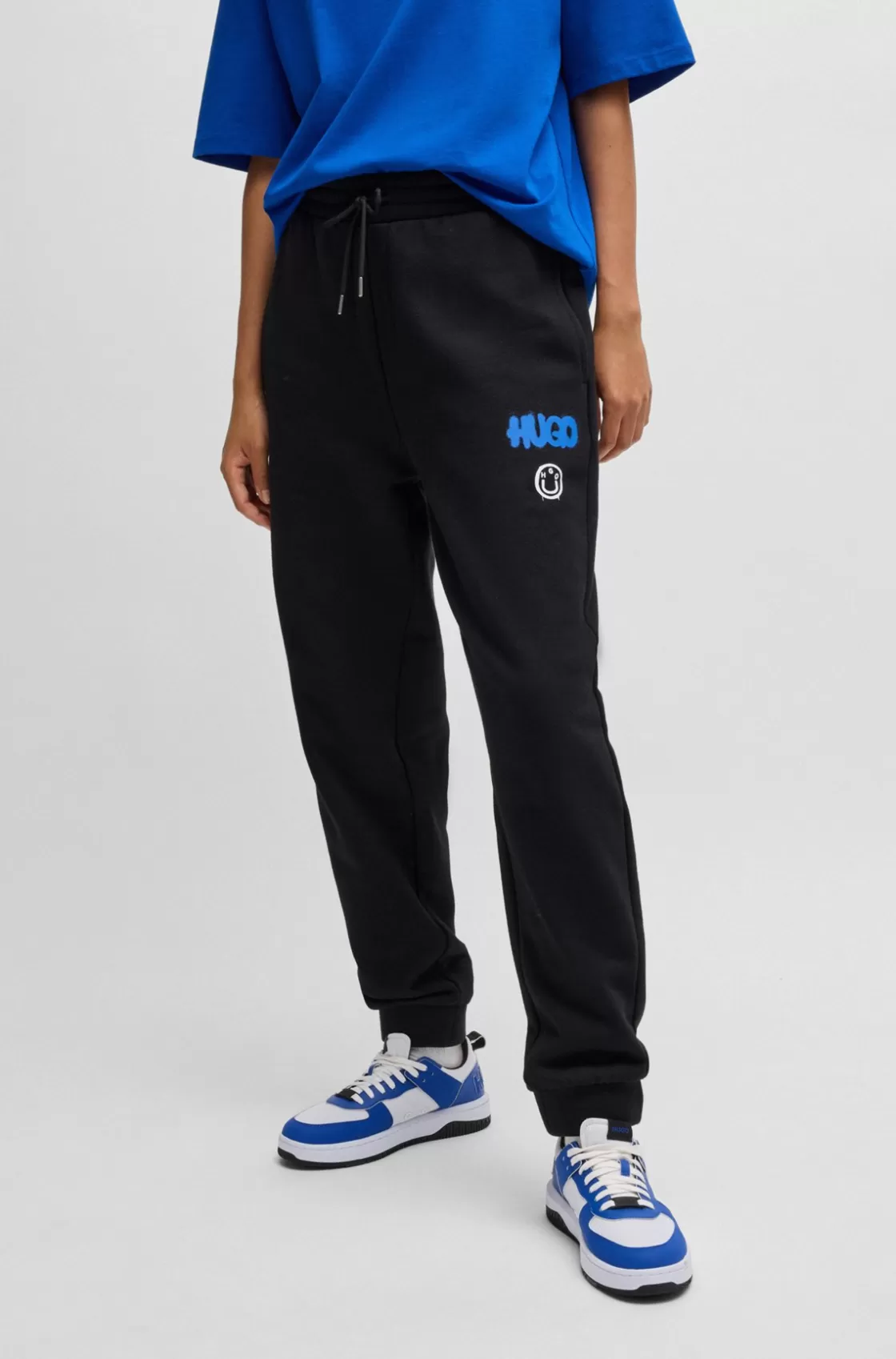 HUGO BOSS Cotton-terry Tracksuit Bottoms With Happy HUGO Logo Black Flash Sale